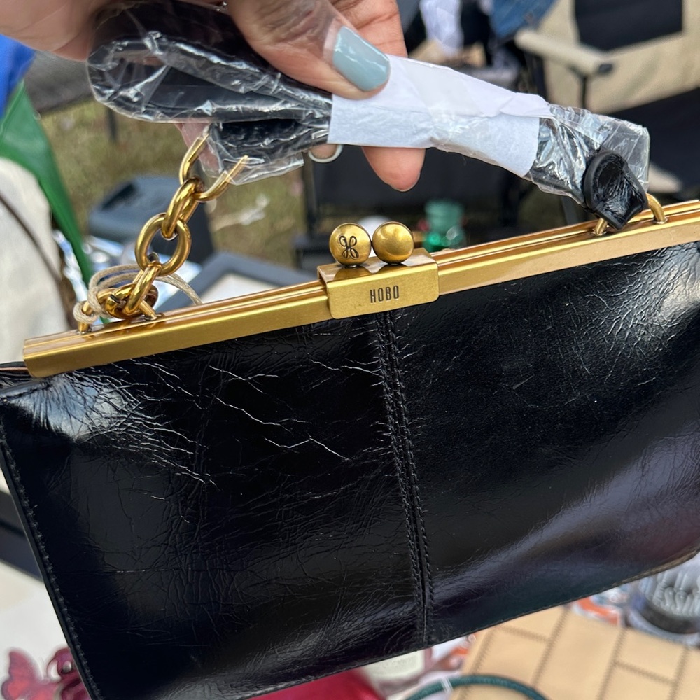 HOBO Black Leather Clutch with Gold Accents
